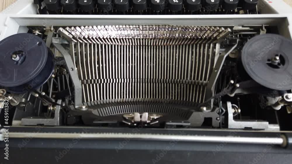 Poster mechanism of a retro typewriter. old typewriter hammers. close up.