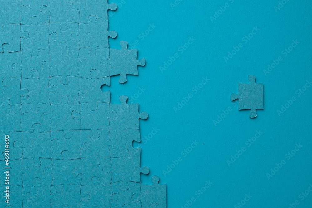 Poster from chaos to order, concept. the puzzle element moves towards the correctly assembled puzzle.