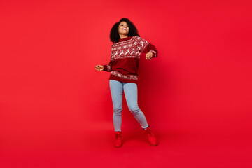 Full length body size photo woman smiling chilling laughing dancing at party isolated vivid red color background © deagreez