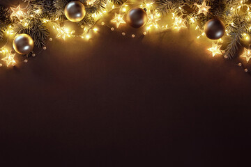 Christmas and New Year background with fir branches, christmas balls and lights