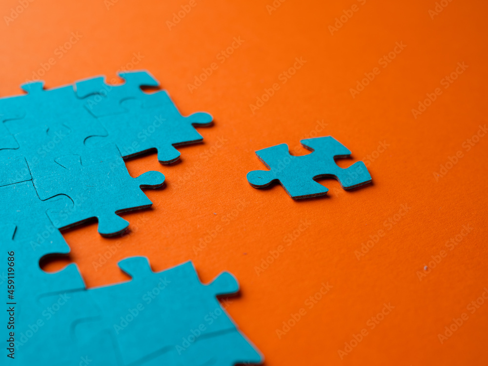 Poster from chaos to order, concept. the puzzle element moves towards the correctly assembled puzzle.