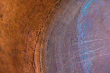 Oxidized copper background with bright colors. Copper surface. Copy space.