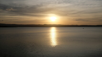 Fototapeta na wymiar Sunset over the river