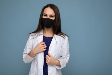 Young woman wearing an anti virus protection mask to prevent others from corona COVID-19 and SARS...