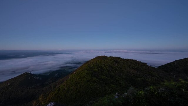 primal earth images transition night to sunrise with fog time lapse