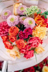 Flower show in the store. Bouquet of dahlias, roses, comb celosia.