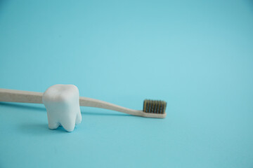 dentistry background blue, tooth and toothbrush, dentist