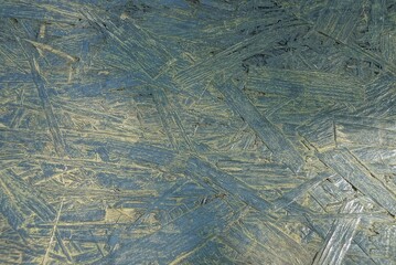 black gray wood texture of a piece of plywood in the wall