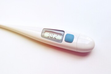 Digital medical thermometer for measuring fever display showing temperature 38.2 celsius.