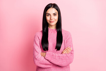 Fototapeta premium Photo portrait of woman with crossed arms isolated on pastel pink colored background