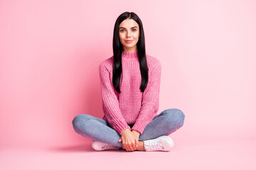 Full body portrait of adorable satisfied lady sit floor lotus pose look camera isolated on pink color background