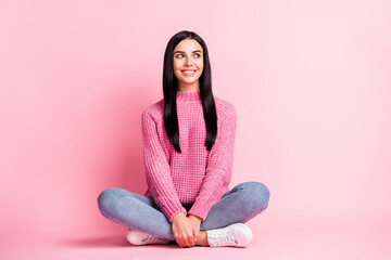 Full body photo of adorable positive person sit lotus pose toothy smile look empty space isolated on pink color background