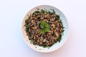 Gebratene Steinpilze mit Weißwein, Zitronensaft und frischer Petersilie.