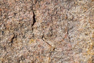 Granite stone surface texture. Texture of rough granit stone surface background. Abstract background from natural material