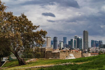 Abrashа Park and the historic buildings of Old Jaffa against the backdrop of the modern buildings...