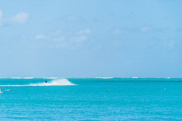 Fototapeta na wymiar Person Jet Skiing in beautiful Caribbean waters