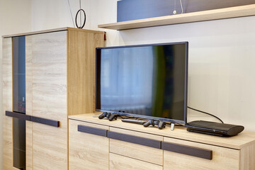 Telewizor LCD w nowoczesnym mieszkaniu - obrazy, fototapety, plakaty