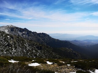 hiker on the top of the snowy mountain