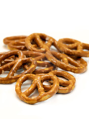 Salted mini pretzel snacks isolated on white background