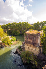 Along the banks of the Tiber River in Rome. Ancient bridges