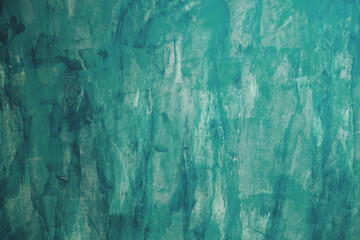 Turquoise stucco wall grungy backdrop