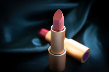 lipstick on a silk background elegance