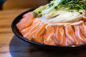 Salmon sashimi on ice, Japanese food izakaya style