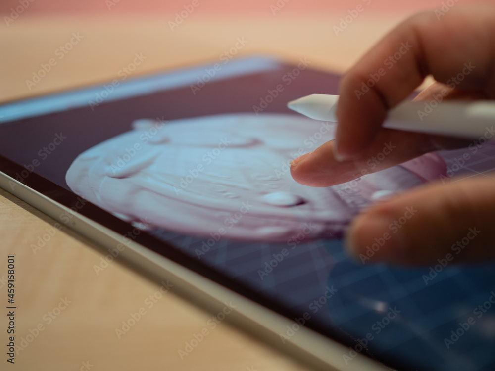 Fototapete 3d modeling in a mobile application, the author's hand creates a three-dimensional model on the tabl
