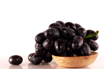 the isolated white background, Grapes Vítis vinífera cultural (Latin) - a type of long-term shrubby lianas from the sort Grapes of Family Grape. Fruits of grapes are used in fresh food,