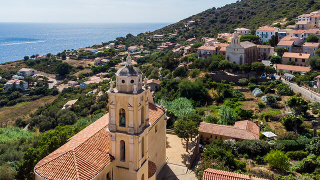 Aerial view of the two churches of Carg&egrave;se in Corsica, France - Seaside village of Greek origins with Orthodox and Catholic churches facing each other above the Mediterranean Sea