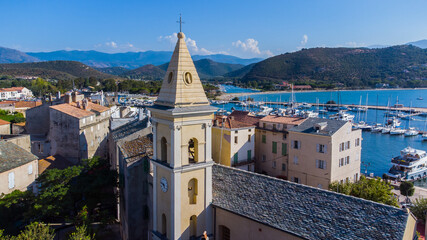 Fototapeta na wymiar Aerial view of the church of Saint Florent, a coastal town on the Cap Corse in Upper Corsica, France