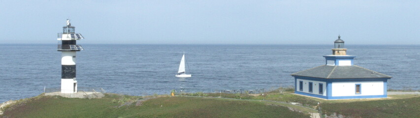 Seascape whit the lighthouse of 'Pancha island' in the coast of Ribadeo, Galicia, Spain