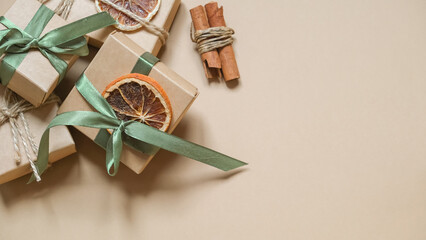 Christmas gift zero waste, eco friendly hand made box packaging gifts in kraft paper wooden table, eco christmas holiday concept, Christmas gift wrapping,eco decor banner