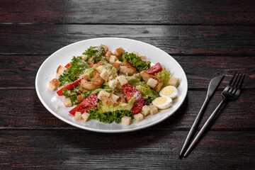 Delicious fresh salad with shrimp for the festive table