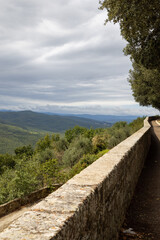 Fototapeta premium Montalcino is a hill town and comune in the province of Siena, Tuscany, central Italy known for Brunello di Montalcino a red DOCG Italian wine produced in the vineyards surrounding the town 