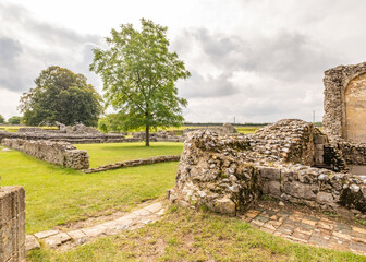 The stone and flint remains of a thirteenth century disused and derelict priory in the English countryside. A well preserved historical site that is well worth visiting.