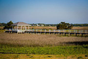 Beautiful gazebo stands above the marsh grasses, perfect for bird watching in Carolina Beach State Park