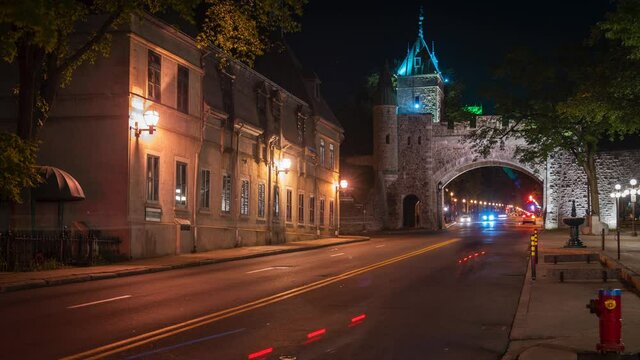 Quebec City, Canada, time lapse view of night traffic at historical landmark St Louis Gate in Old Quebec.