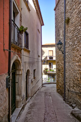 Fototapeta na wymiar A narrow street in Monteroduni, a medieval town of Molise region, Italy.