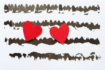 not recognizable property - two hearts and black ink background