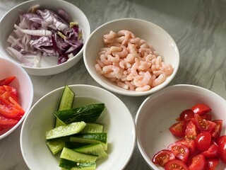 Home-cooked meal and preparations. Vegetables, Berries,  and sauce.