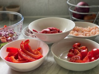 Home-cooked meal and preparations. Vegetables, Berries,  and sauce.