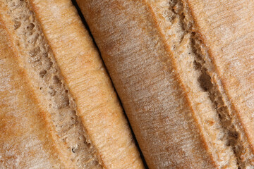 Crispy ciabattas as background, closeup. Fresh bread