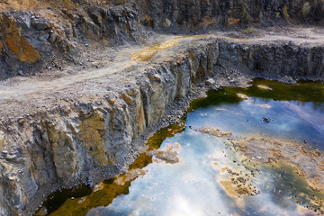 Granite quarry with a gray grade of a stone.
