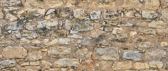 Natural stone wall. Seamless texture. Perfect tiled on all sides.