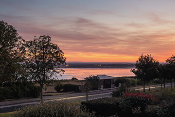 A beautiful evening sunset sky reflecting in Pegwell Bay as seen from the esplanade on Ramsgate west cliff.