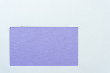 lavender paper behind a paper frame