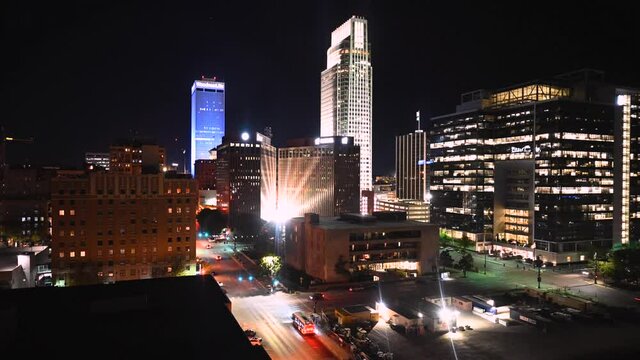 Omaha, Nebraska  USA – September 7, 2021: Timelapse video of downtown Omaha at night.
