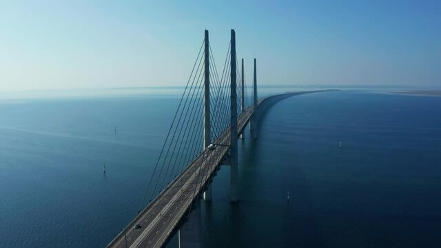 Panoramic aerial view of the Oresundsbron bridge between Denmark and Sweden. Close up view of the Oresund Bridge on a clear sunny day.