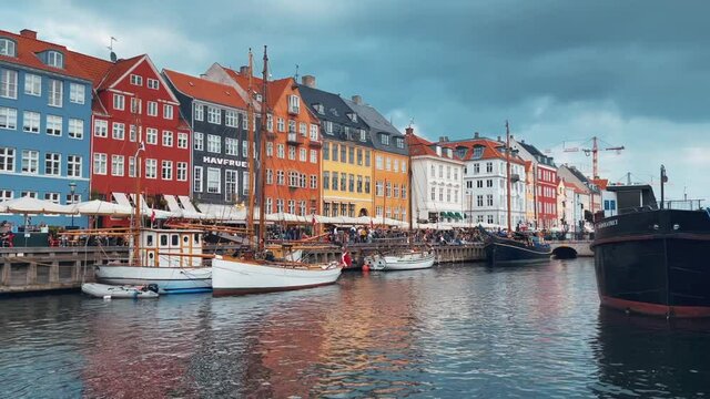 Aerial view of famous Nyhavn pier with colorful buildings and boats in Copenhagen, Denmark. The most popular place in Copenhagen.